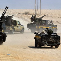 Bị quân Gaddafi đánh tơi tả, NTC cầu cứu 